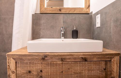 Emsdetten Apartment | Ideal Stay at Refugium am Wasserturm with Hot Tub & Dining