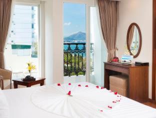 Tran Phu Beach Hotel | Regalia Nha Trang: Oceanfront Retreat with Pool & High Ratings