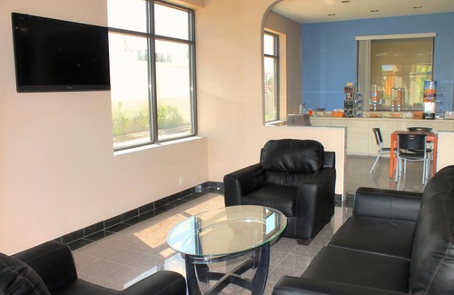 St. Augustine Beach Hotel | Regency Inn & Suites: Enjoy Poolside Stay with Breakfast