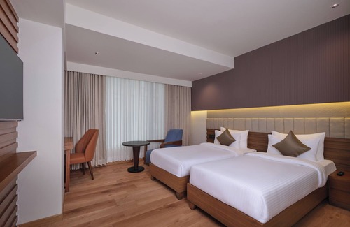Thaltej Hotel | Regenta Place Ahmedabad