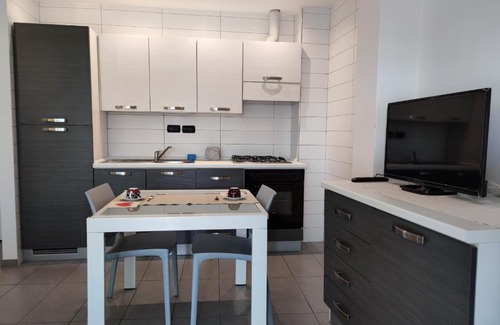 Miramare Apartment | Regina Margherita: Family-Friendly Stay with Hot Tub Bliss