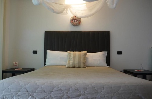 Miramare Apartment | Regina Margherita: Family-Friendly Stay with Hot Tub Bliss
