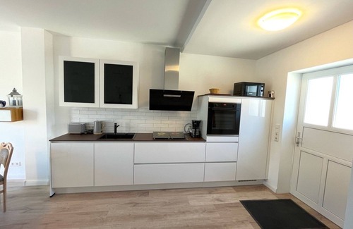 Maasholm House | Scenic Reihenhaus Hafenblick with Ocean Views & Family Amenities