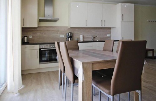 Plau am See House | Inviting Terraced House with Harbor Flair by Plauer See