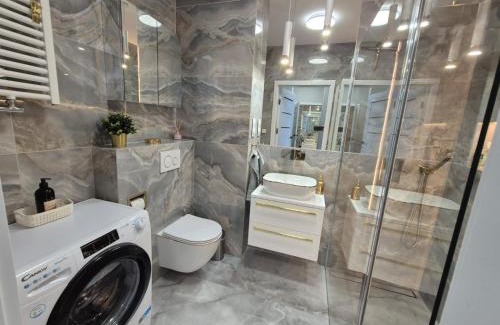 Ploty Apartment | REKO apartament z basenem i SPA tuż przy plaży