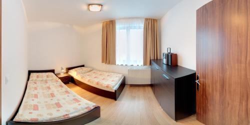 Vyhne Apartment | Discover Rekreačný dom Vyhne: Family-Friendly Getaway