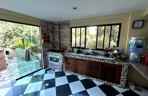 Jacarepagua House | Relax in nature with a mountain climate. Pets are allowed, because of the pool and barbecue.