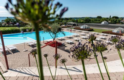 Moniga del Garda Villa | Discover Relax al Porto Gerale: Oceanfront Bliss Awaits