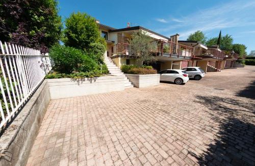 Moniga del Garda Villa | Discover Relax al Porto Gerale: Oceanfront Bliss Awaits