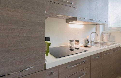 Calvairate Apartment | Stylish Retreat Steps from City Center with Spa & Breakfast
