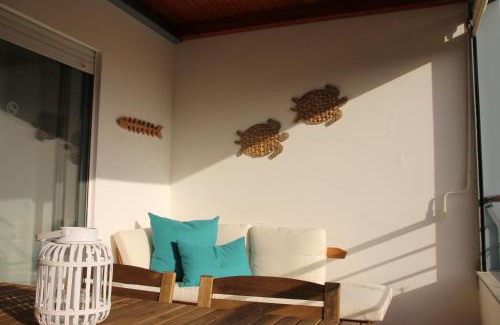 Telheiro Apartment | Relax and Unwind: Pool, Garden & Beach Near City Life