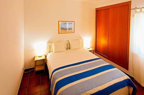 Telheiro Apartment | Relax and Unwind: Pool, Garden & Beach Near City Life