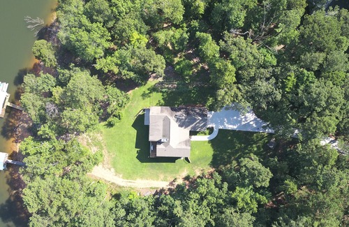 Tignall House | Lakefront Family Retreat with Pool and Ocean Views