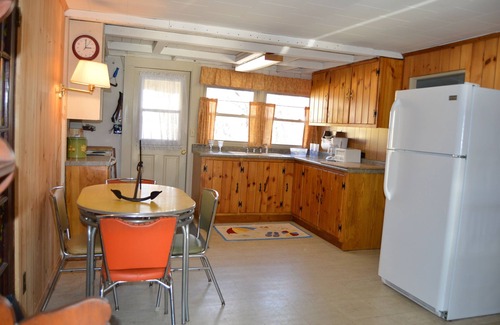 Wells Cottage | Relax in this comfy Log Cabin after your short walk back from the beach
