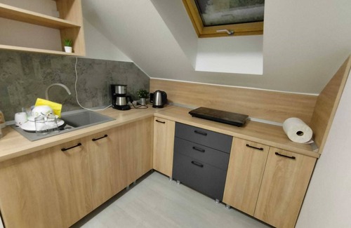 Timisoara Apartment | Relax in a Stylish Loft with Spa & Retro Gaming Fun