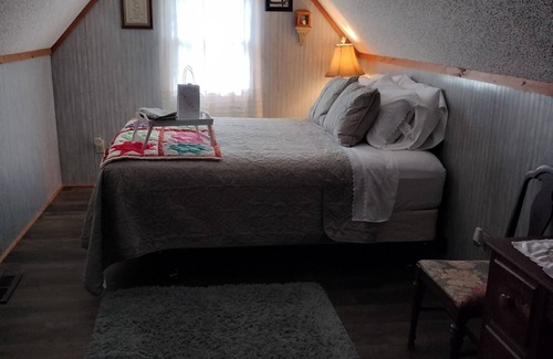 River Falls Other | Enjoy Relaxing Porches and Spa Amenities at Our Hotel
