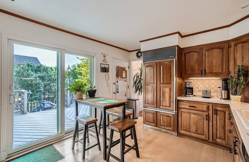 Park East House | Charming Cozy Home with Fireplace, Yard, and Fun Amenities
