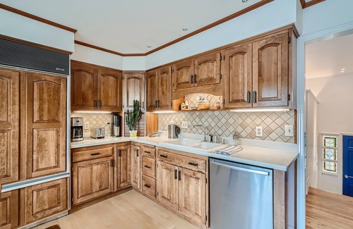 Park East House | Charming Cozy Home with Fireplace, Yard, and Fun Amenities