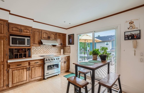 Park East House | Charming Cozy Home with Fireplace, Yard, and Fun Amenities