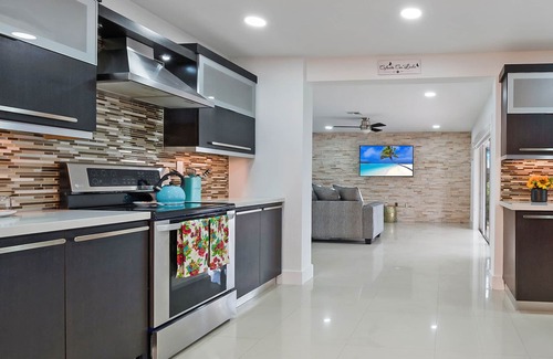 Richmond West House | Experience Bongo's House: Private Pool & Game Room Retreat