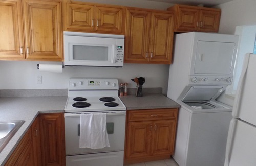 Williams Town Condo | Soothing Oceanfront Retreat with Pool and Spa Amenities