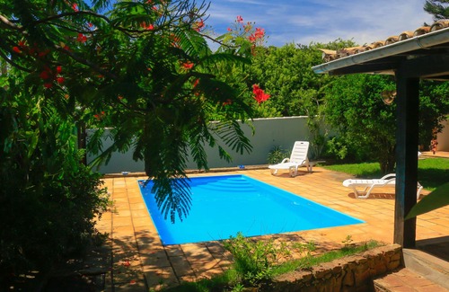 Marina House | Tranquil Escape: Poolside Relaxation in Nature's Embrace
