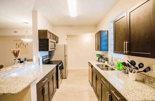 Fort Myers Apartment | Cozy King Bed Room with Full Kitchen & Pool Access