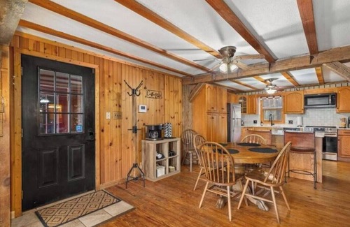 Bellville Cabin | Cozy Cabin with Hot Tub, Fire Pit & Top Guest Rating!