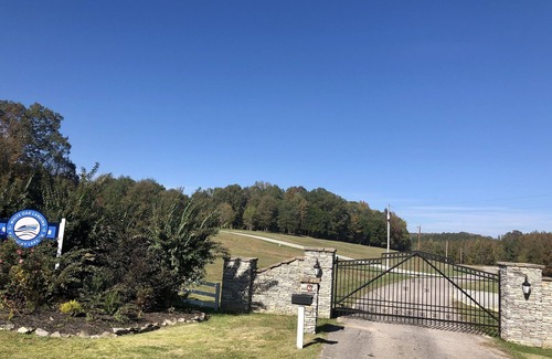 Flatwoods RV Rental | Pet-Friendly Waterfront RV Lot with Scenic River Views