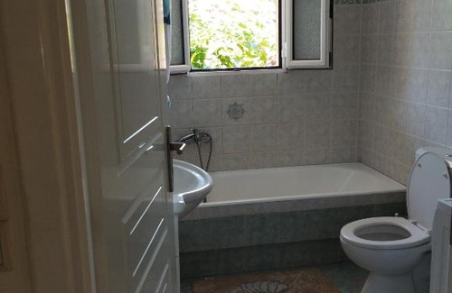Akraifnion Apartment | Cozy Home Retreat with Family-Friendly Amenities