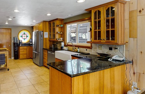 Bass Lake House | Inviting Lakefront Retreat with Private Dock and Spa Amenities