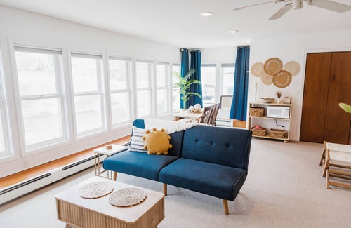 Elkader Apartment | Indulgent Riverfront Suite on Historic Main Street