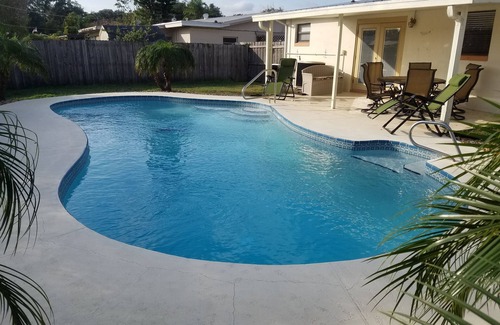 Titusville House | Idyllic Tropical Pool Home Near Beach and Disney Magic