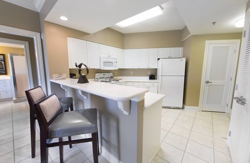 Beachside Village Apartment | Tranquil Villa with Pool and Oceanfront Amenities