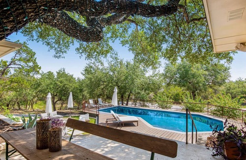 Barton Bend House | Remarkable villa with private pool, patio, game room, fireplace & gorgeous views