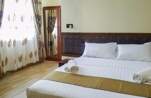 Nilandhoo House | Relax at Remora Inn: Private Beach & Ocean View Await