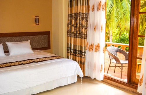 Nilandhoo House | Relax at Remora Inn: Private Beach & Ocean View Await