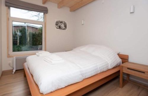 Renesse House | Tranquil Retreat Near Beach with Family-Friendly Garden
