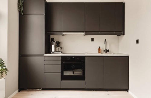 Bergen City Centre Apartment | Modern Hotel Near Bryggen with SMART TV & Family Amenities