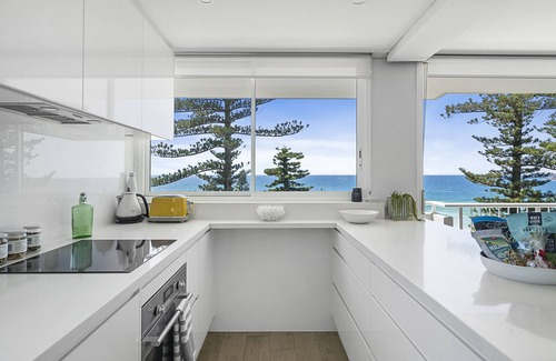 Sydney Apartment | Renovated Beachfront Retreat with Breathtaking Views