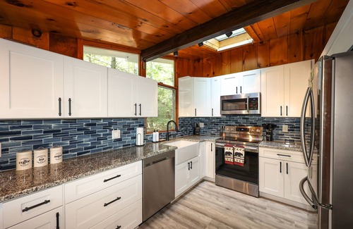 Meredith Cottage | Renovated Home Steps from Beach on Lake Winnipesaukee