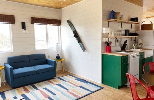 Camdenton Cabin | Renovated Lakeside Cabin with Pool & Unique Resort Amenities