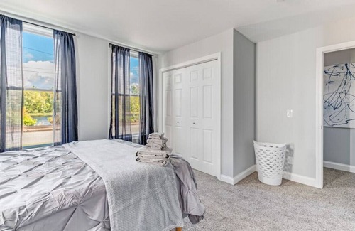 Milford Apartment | Renovated Riverfront 4 BD | Sleeps 8 | Parking