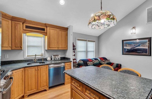 Point Pleasant Beach Condo | Renovated, open concept 1BR unit w/porch room, futon in LR, huge basement, 2 badges to beach!