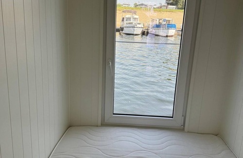 Lathum House | Rent your own unique houseboat for 4 people on the water.
