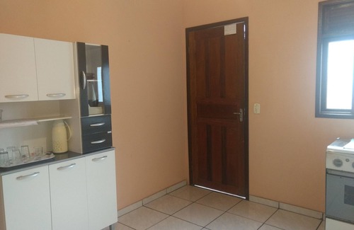 Praia do Morro Apartment | Oceanfront Kitchen-1 Apartment Near Morro Guarapari Beach