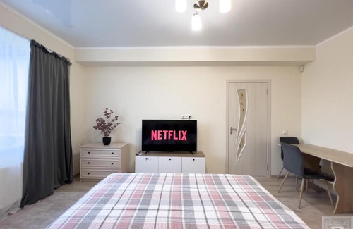 Riscani Apartment | Cozy Stay at RentHouse Apartments with Child-Friendly Amenities