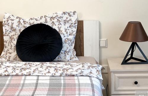 Riscani Apartment | Cozy Stay at RentHouse Apartments with Child-Friendly Amenities