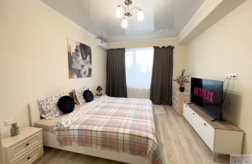 Riscani Apartment | Cozy Stay at RentHouse Apartments with Child-Friendly Amenities