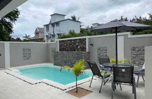 Flic-en-Flac House | Discover Residence 1129 - Block 1 with Pool & Hot Tub